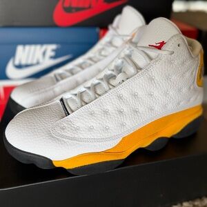 Air Jordan 13 Retro
White/Del Sol/Black/University Red